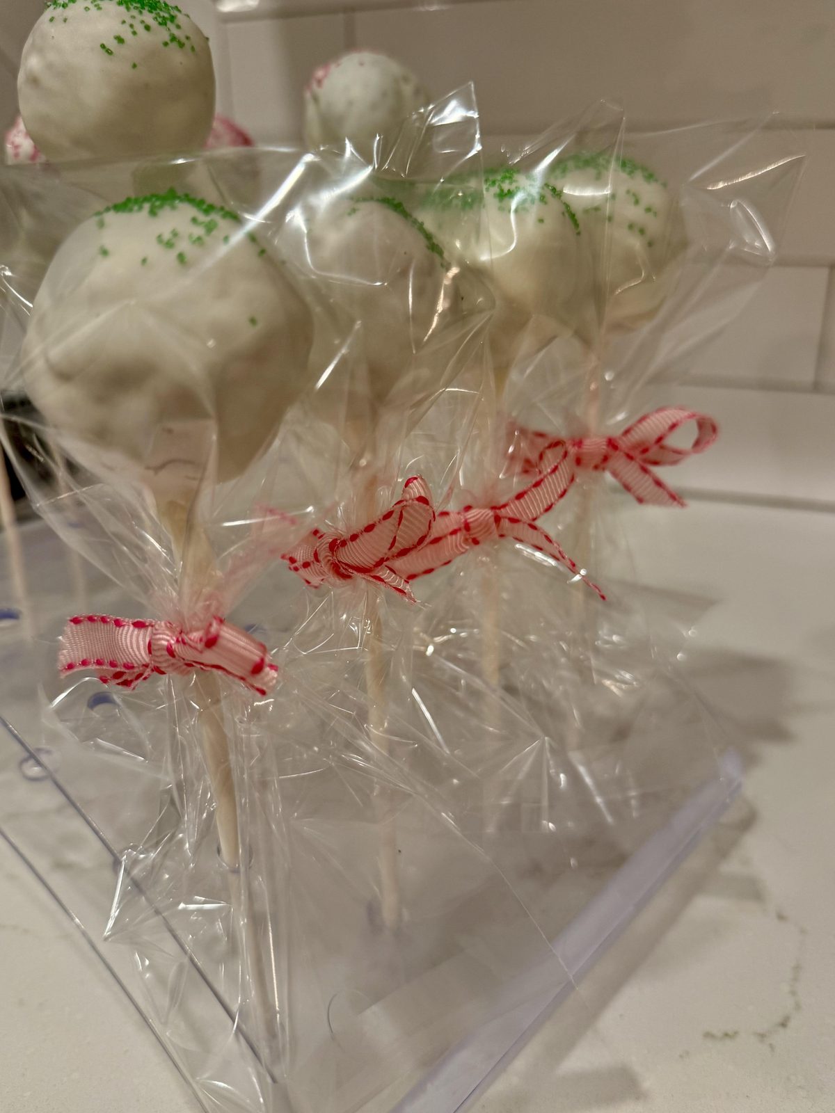 Wrapped cake pops with ribbon